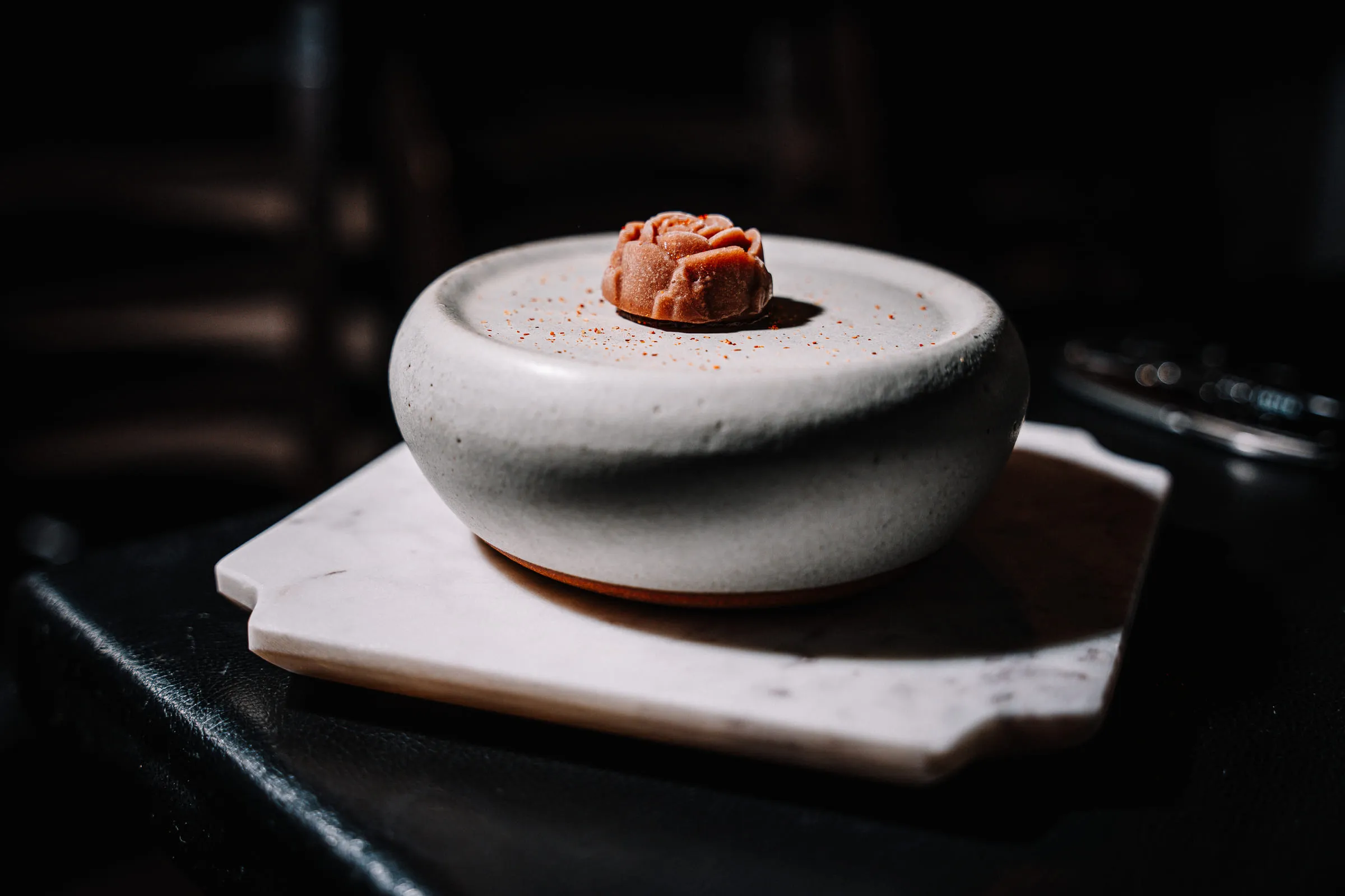 Quenelle on stoneware bowl — Food photography by JP Media Groups