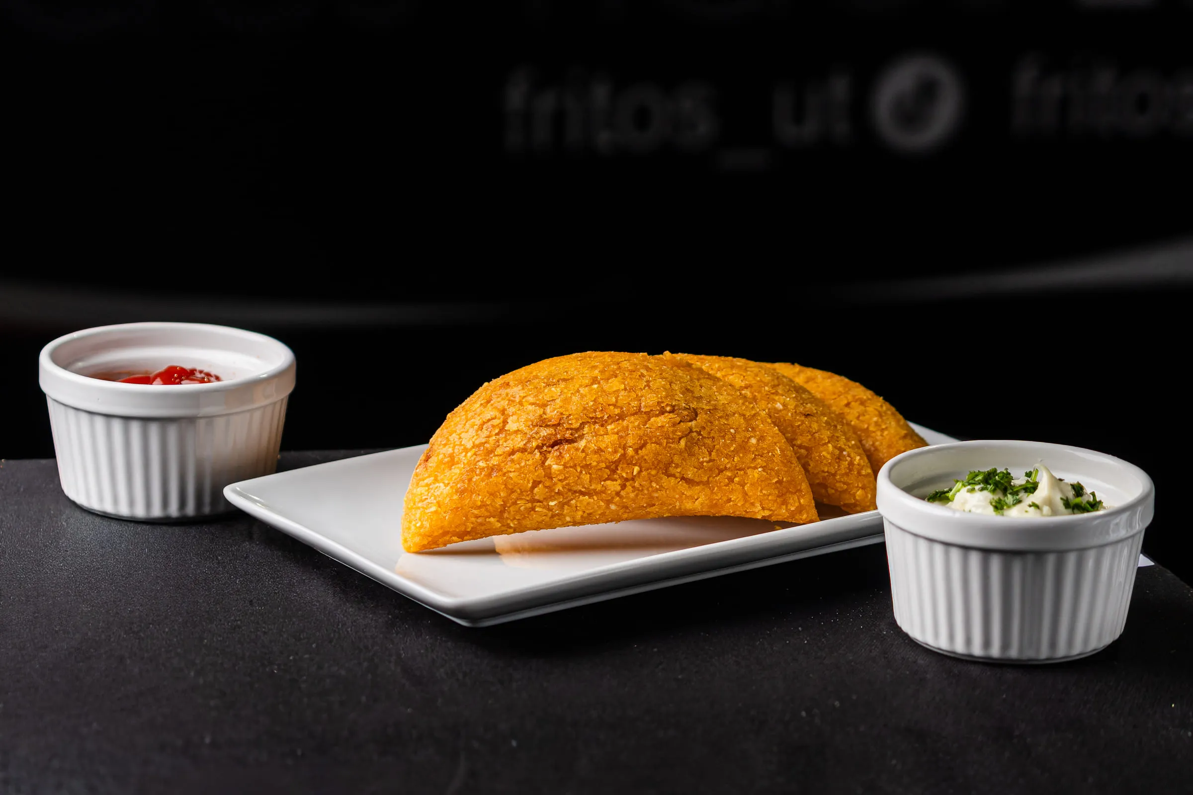 Empanada with two sauces — Food photography by JP Media Groups