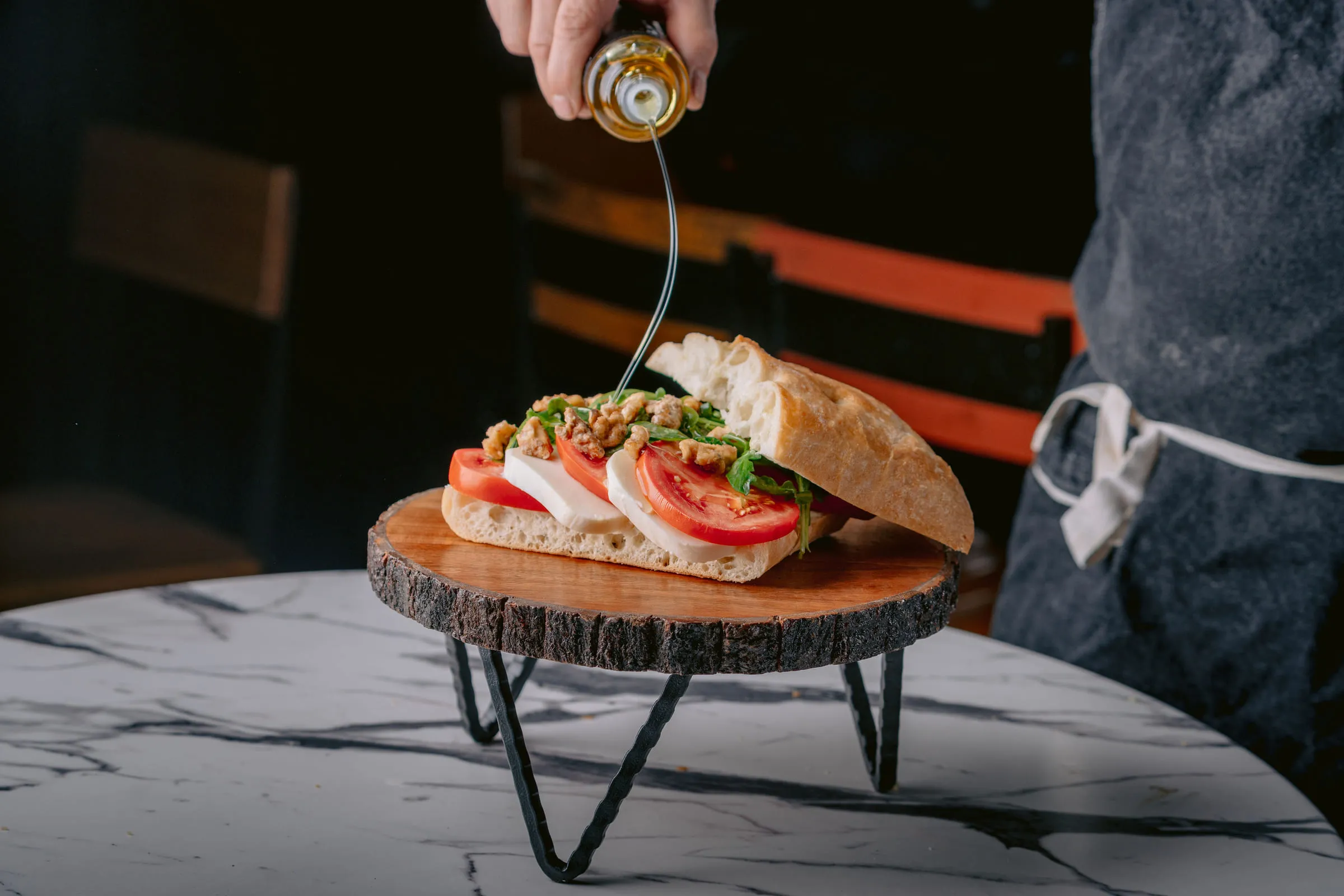 Sandwich with oil pour — Food photography by JP Media Groups
